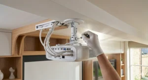 A ceiling-mounted projector installation showing the tidy cable management.