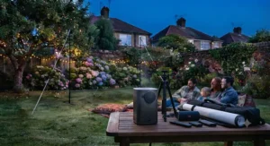 Complete kit including a battery-powered projector, tripod stand, and portable garden cinema projector screen.